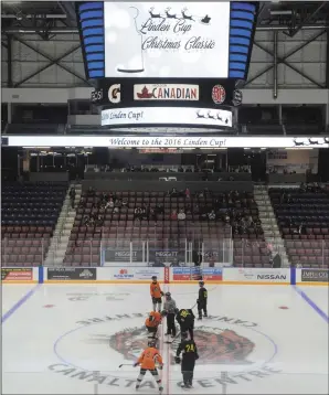  ?? NEWS PHOTO RYAN MCCRACKEN ?? The Canucks and Tigers face off for the third annual Linden Cup Christmas Classic charity hockey game Friday, Dec. 23, 2016 at the Canalta Centre. The event raised $17,000 and 245 pounds of food for the Medicine Hat Food Bank.