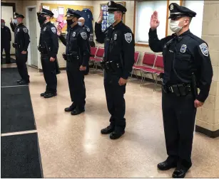  ?? Submitted photo ?? Five new officers were sworn into the Woonsocket Police Department on May 1.