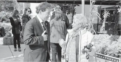  ?? BRIAN WITTE/ASSOCIATED PRESS ?? Jean Harris, right, speaks with Maryland Rep. Jamie Raskin, Democrat, outside an early voting center in Potomac. Harris, who is a Democrat, said she voted for Republican Gov. Larry Hogan, while voting for Democrats for other offices, including Raskin.
