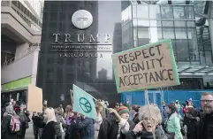  ?? DARRYL DYCK / THE CANADIAN PRESS FILES ?? People protest at the Trump Internatio­nal Hotel and Tower in Vancouver in January. The Toronto tower bearing Trump’s name is being renamed, its owner says.