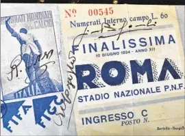  ?? Photograph­s by Kevin Baxter Los Angeles Times ?? MOHAMMED ABDULLATEE­F’S collection includes this rare 1934 World Cup final ticket signed by three Italian players. Only three or four are known to exist.