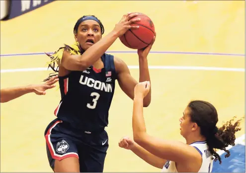  ?? Noah K. Murray / Associated Press ?? UConn’s Aaliyah Edwards (3) drives to the basket against Seton Hall on Tuesday in South Orange, N.J.