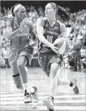  ?? Jessica Hill Associated Press ?? SEATTLE’S Sue Bird, right, is hoping to win her fourth gold medal with the U.S. team.