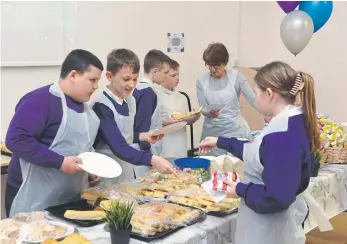  ?? ?? Year 6 pupils served food and drinks to over 300 customers.