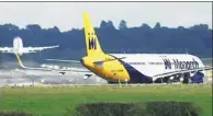  ?? TOBY MELVILLE / REUTERS ?? A Monarch Airlines passenger aircraft.