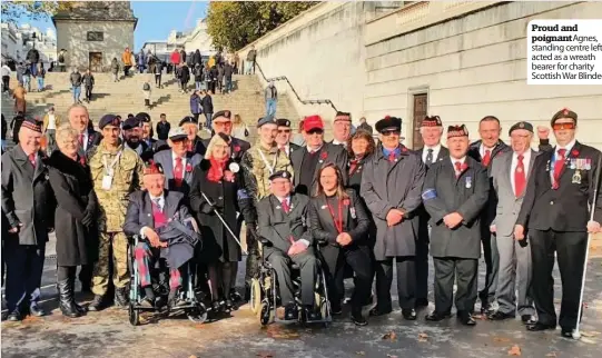  ??  ?? Proud and poignant Agnes, standing centre left, acted as a wreath bearer for charity Scottish War Blinded