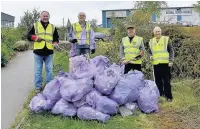  ??  ?? Some of the many bags of rubbish collected