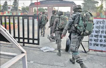  ?? NITIN KANOTRA/HT ?? Security personnel at the Sunjuwan military station in Jammu on Saturday.