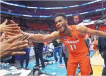  ?? PAUL SANCYA/ ASSOCIATED PRESS ?? Syracuse forward Oshae Brissett celebrates after defeating No. 3 Michigan State on Sunday. Syracuse is the No. 11 seed in the Midwest that entered the tournament among the First Four. Syracuse will face No. 2 Duke in the Sweet 16 on Friday.