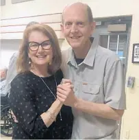  ?? LISA WARREN ?? Lisa Warren dances with husband, Bill, on Feb. 7 at the Winter Springs memory care facility where he lives.