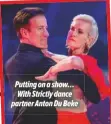  ??  ?? Putting on a show… With Strictly dance partner Anton Du Beke