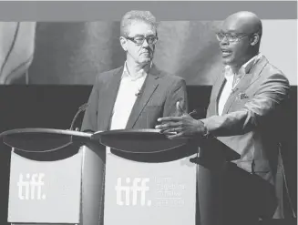  ?? Michelle Siu/the Canadian Press ?? Toronto Internatio­nal Film Festival CEO Piers Handling, left, and artistic director Cameron Bailey announce this year’s movie lineup for TIFF at a news conference Tuesday in Toronto.