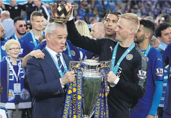  ?? Picture / AP ?? Claudio Ranieri and Leicester were crowned champions in one of the most remarkable triumphs in football history last season but it’s been downhill ever since for the club.