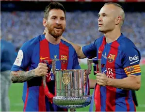  ?? Reuters ?? Barcelona’s Lionel Messi and Andres Iniesta celebrate with the Copa del Rey trophy. —