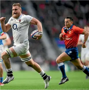  ?? GETTY IMAGES ?? Former Hurricanes loose forward Brad Shields races away to score one of his two tries in England’s convincing win over Italy.