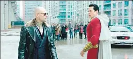  ?? Warner Bros. Pictures ?? “SHAZAM!,” out April 5, with Mark Strong, left, and Zachary Levi in title role.