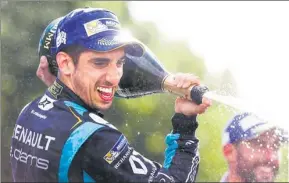  ?? ALASTAIR STALEY/LAT/FORMULA E ?? Renault’s Sebastien Buemi sprays champagne on the podium after winning Saturday’s FIA Formula E Championsh­ip Qatar Airways Paris ePrix.
