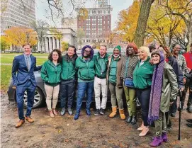  ?? Chatwan Mongkol/Hearst Connecticu­t Media ?? Mayor Justin Elicker and U.S. Rep. Rosa DeLauro, D-3, with Elm City COMPASS team staffers on Nov. 1, 2022 in New Haven.