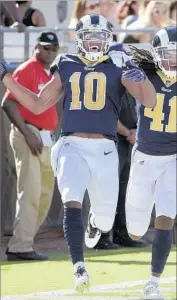  ?? Phelan M. Ebenhack Associated Press ?? PHAROH COOPER celebrates after scoring on a 103-yard kickoff return against Jacksonvil­le.