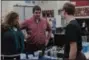  ?? KRISTI GARABRANDT — THE NEWSHERALD ?? Chardon High School sophomore Owen Vucetic speaks to Suzanne Wilson and Keegan Nick of Kinetico Water Systems during the Career Fair at Chardon High School on March 1.