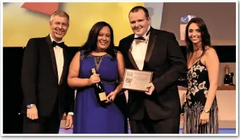  ?? PAUL BIGLAND/ RAIL. ?? Station shift managers Matt Jump and Kyla Thomas receive the National Rail Awards Major Station of the Year award from BBC Radio 4 presenter and NRA host Justin Webb (far left), and stage assistant Gabriella Lester (far right).