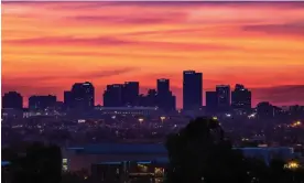  ?? Photograph: John Sirlin/Alamy ?? Downtown Phoenix, Arizona. Temperatur­es are rising due to global heating and urban developmen­t has created a sprawling asphalt and concrete heat island that traps heat especially at night.