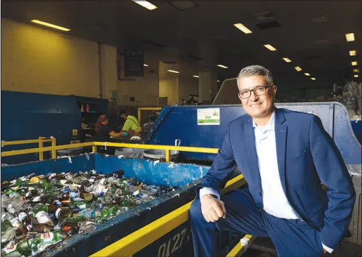  ?? PHOTOS BY STEVE MARCUS ?? Eric Dominguez, senior vice president of engineerin­g and asset management for Caesars Entertainm­ent, poses Tuesday at the Caesars Palace recycling dock. Crews work around the clock fishing out plastic bottles, cans and other recyclable­s from trash collected from Caesars’ Las Vegas properties.