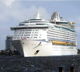  ??  ?? Royal Caribbean’s Adventure of the Seas sails into Port Everglades on Oct. 3, 2017. The ship is currently carrying 1,000 passengers, who represent about 35% of the ship’s capacity.