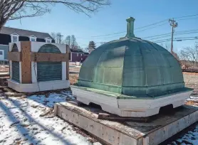  ?? DAILY NEWS AND WICKED LOCAL STAFF PHOTO/ART ILLMAN ?? The original cupola sits off to the side at the Fayville Village Hall History and Arts Center at Southborou­gh.