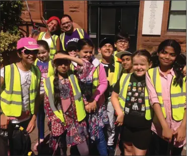  ??  ?? Children from Big Noise Govanhill take part in a local litter pick, making sure streets were left spick and span