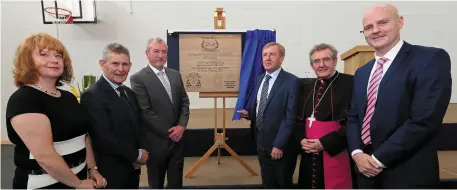  ??  ?? Michael Creed TD, Minister for Agricultur­e, Food and the Marine, unveils the plaque, also included are Carol O’Mahony, Deputy Principal Colaiste Mhuire, Ted Owens, CE Cork ETB, Sean O’Sullivan, Chairman Board of Management, Bishop William Crean, Bishop...