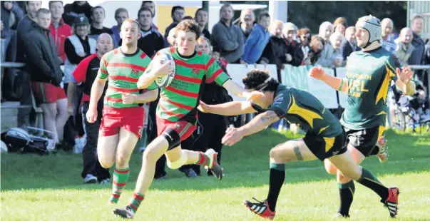  ??  ?? John Pugh, pictured in previous action against Nant Conwy, scored a hat-trick for Pwllheli against Caernarfon last Saturday