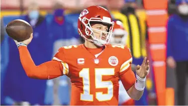  ?? REED HOFFMANN/ASSOCIATED PRESS ?? Kansas City quarterbac­k Patrick Mahomes, at age 25, will be trying to become the youngest quarterbac­k to win multiple Super Bowls when the Chiefs face the Tampa Bay Bucs on Sunday.