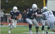  ?? MEDIANEWS GROUP FILE PHOTO ?? Villanova quarterbac­k Daniel Smith, left, runs against Delaware in 2019. Smith and the Wildcats fell to the Blue Hens Saturday, 27-20.