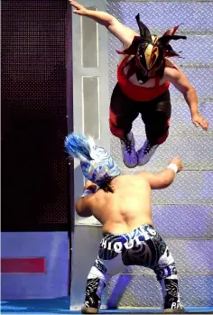  ?? — AFP photos ?? Two dwarf fighters at the Arena Mexico. “Microstars” is a show that mixes sport, circus and collective catharsis in what Mexicans call “fights”.