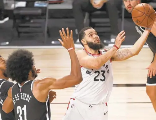  ?? AP ?? Fred VanVleet (23) leads Raptors with 20 in Game 1 win over Nets on Monday, but seven Toronto players score in double figures.