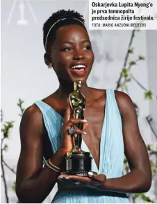  ?? FOTO: MARIO ANZUONI/REUTERS ?? Oskarjevka Lupita Nyong'o je prva temnopolta predsednic­a žirije festivala.