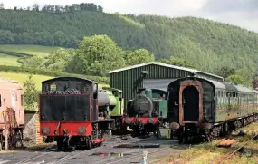  ?? SCOTT ARTUS ?? A view of the Gwili Railway’s new engine shed at Bronwydd Arms on June 15 last year, showing (left to right) the line’s resident ‘Austerity’ 0-6-0STs, RSH Works No. 7170 ‘Welsh Guardsman’ and Vulcan Foundry Works No. 5272 Haulwen, together with visiting Hudswell Clarke 0-6-0T Samuel Fox & Co. No. 20 from the Llangollen Railway.