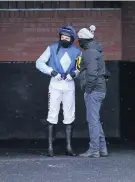  ??  ?? No pressure then Alain Darragh Bourke talks to jockey Alain Cawley before Gallahers Cross’s run.