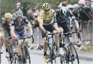  ??  ?? A bleeding Chris Froome (yellow jersey) on the attack at the Tour de France