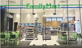  ??  ?? FamilyMart’s first Generation 2 store is now open Global City.