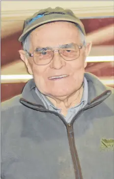  ?? ASHLEY THOMPSON ?? Wolfville Curling Club member Rob Stirling, one of three club members in their 90s, still likes the challenge of competitiv­e curling.