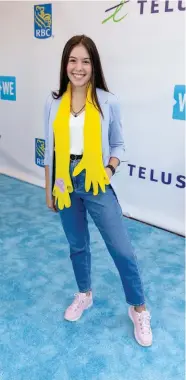  ?? VITO AMATI ?? Maddison with her HUG scarf on the WE Carpet at WE Day Toronto.