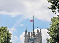  ??  ?? The Union flag flies at half-mast over the Palace of Westminste­r yesterday