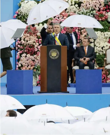  ?? Foto: dpa/Fernando Vergara ?? Präsident Iván Duque bei der Vereidigun­g in Bogota