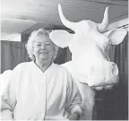  ?? IOWA STATE FAIR ?? Norma “Duffy” Lyon with a butter cow at the 2003 state fair.