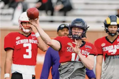  ?? Butch Dill/Associated Press ?? TCU quarterbac­k Max Duggan, who is on the American roster at the Senior Bowl, improved his draft stock from a seventh-round pick or free agent to the fourth or fifth round with his big season in 2022.