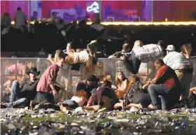  ?? David Becker / Getty Images 2017 ?? Stephen Paddock opened fire Oct. 1 from a 32nd floor suite at the Mandalay Bay hotel into a crowd of 22,000 attending a music festival, killing 58 people.