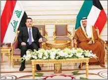  ?? KUNA photo ?? HH the PM with his Iraqi counterpar­t.