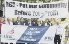  ??  ?? 0 Union members protested outside the AGM over branch closures